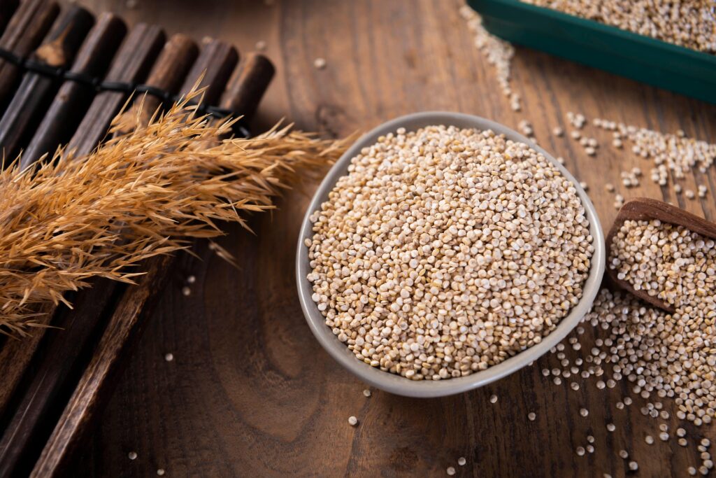 Best healthy moist 100% quinoa bread loaf on a wooden cutting board